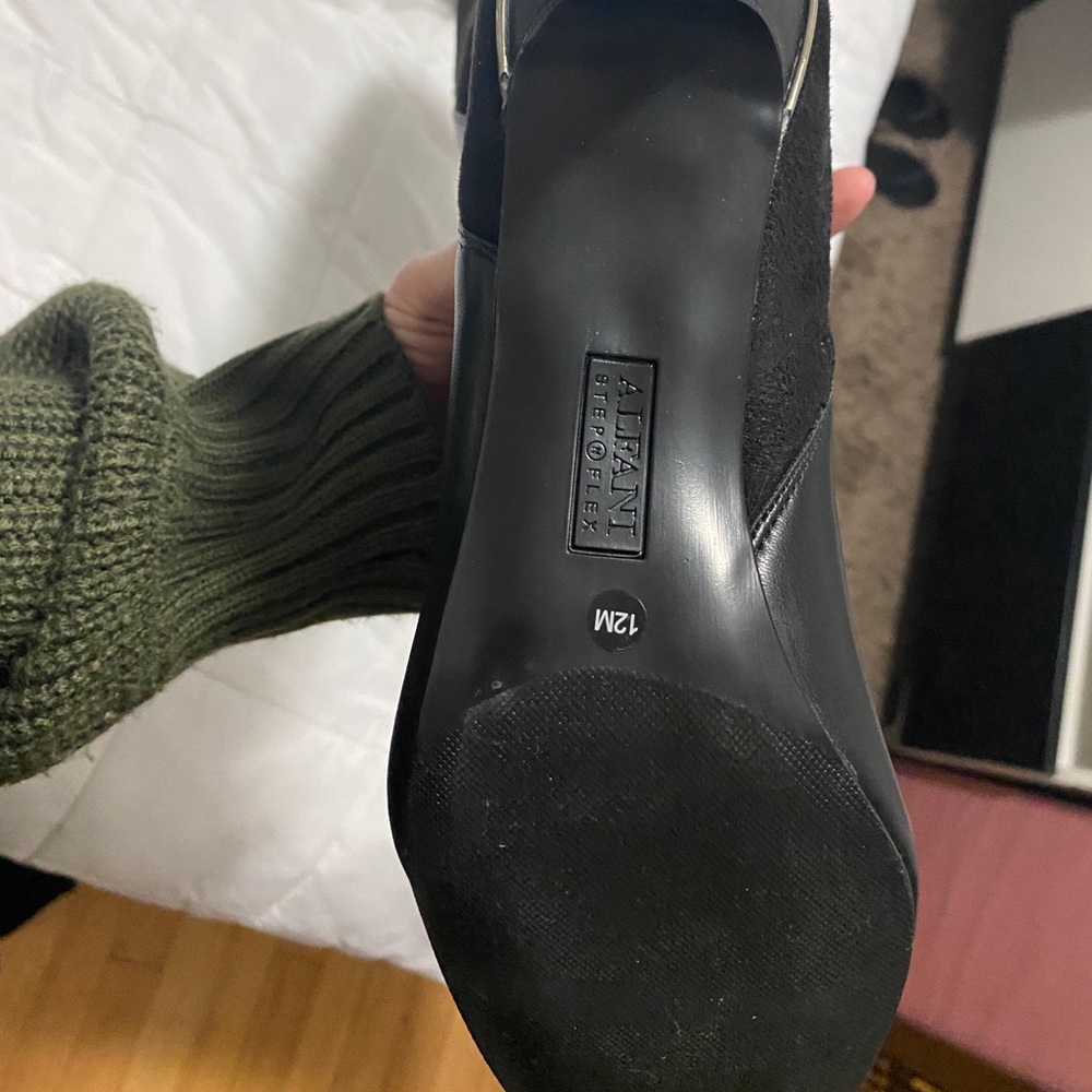 Unworn high leather boots in black